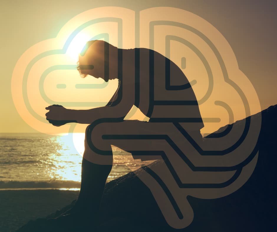 Imagem de uma pessoa sentada à beira-mar durante o pôr do sol, em postura reflexiva, simbolizando autoconhecimento, superação e equilíbrio emocional. Ideal para conteúdos de motivação e autoajuda no site Vam'Bora,Meu!.com.br, com foco em autoestima, desenvolvimento pessoal, coaching, meditação e bem-estar no estilo de vida.